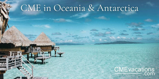 Overwater bungalows with a clear blue sky and turquoise water