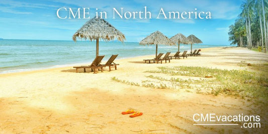 Beach scene with lounge chairs, umbrellas, and a clear sky.