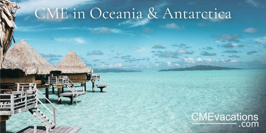 Overwater bungalows with a clear blue sky and turquoise water